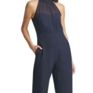 Vince Camuto mock neck illusion jumpsuit in scuba crepe material. Size 6 NWT